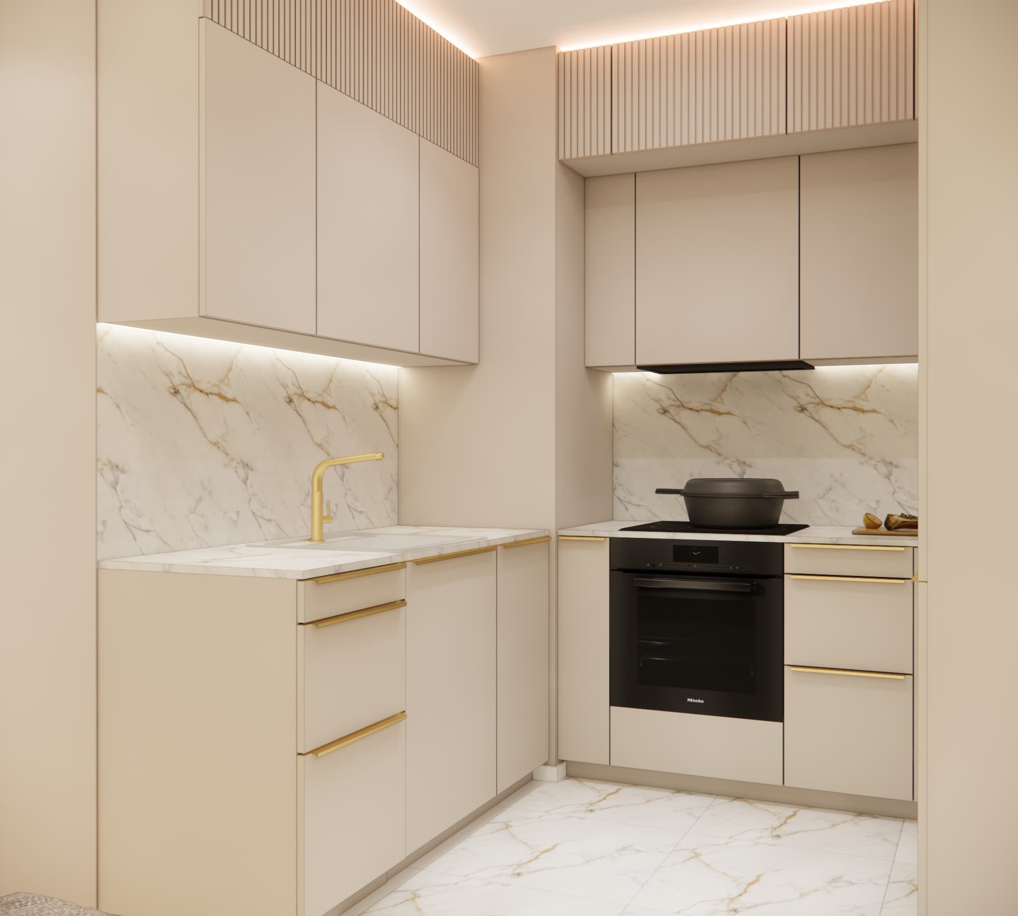 Beige kitchen with light stone countertop and gold handles