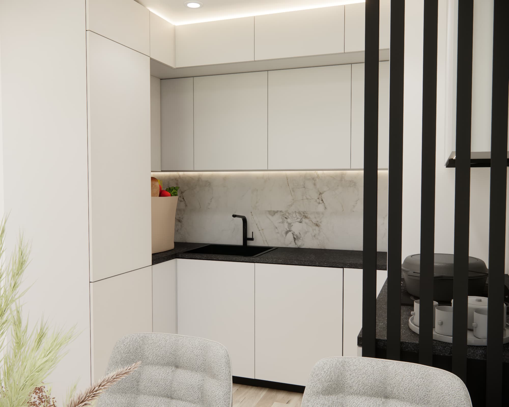 Bright kitchen with a black worktop and marble-effect backsplash