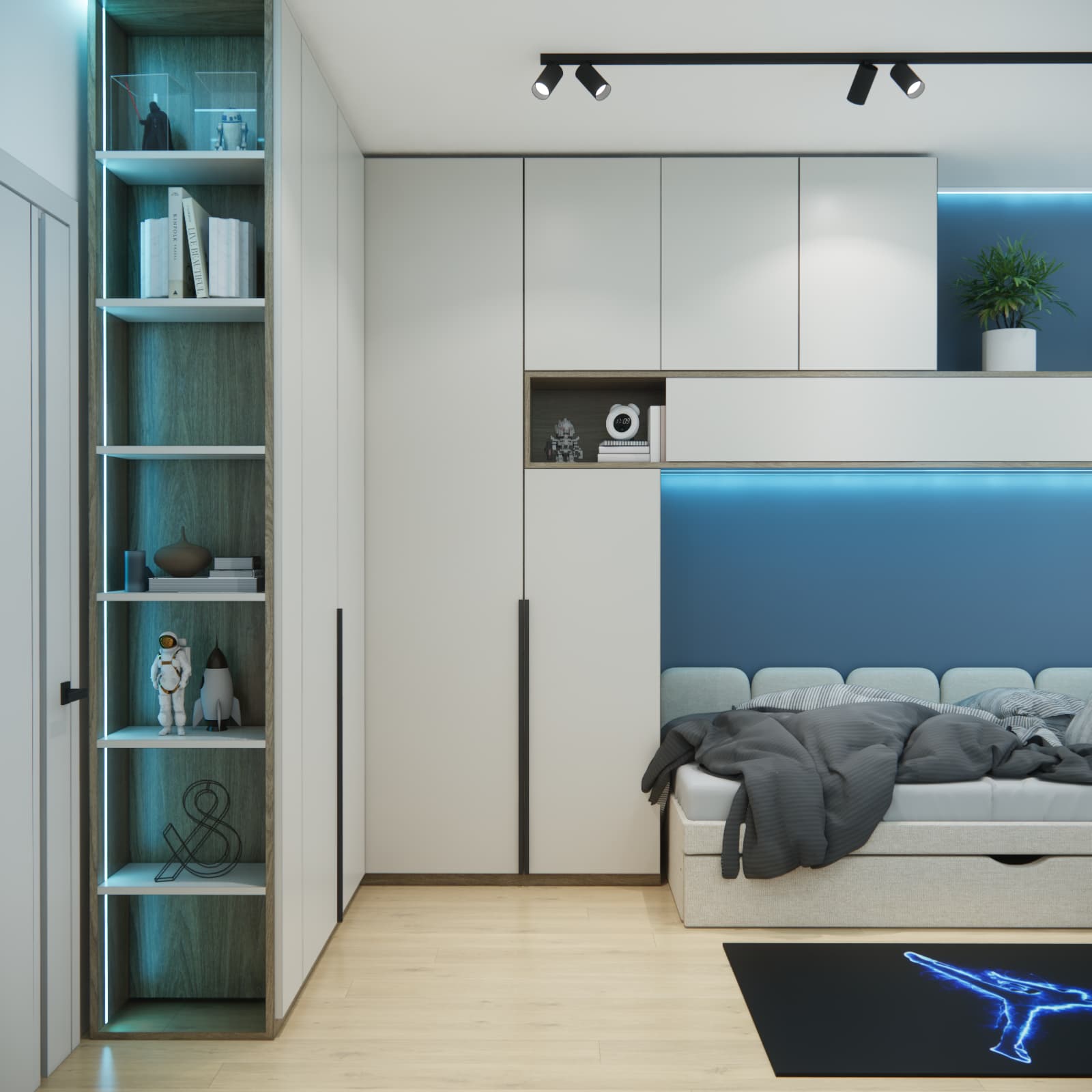 Open shelving with books beside a light-coloured wardrobe and a bed against a blue wall in Kacper’s room