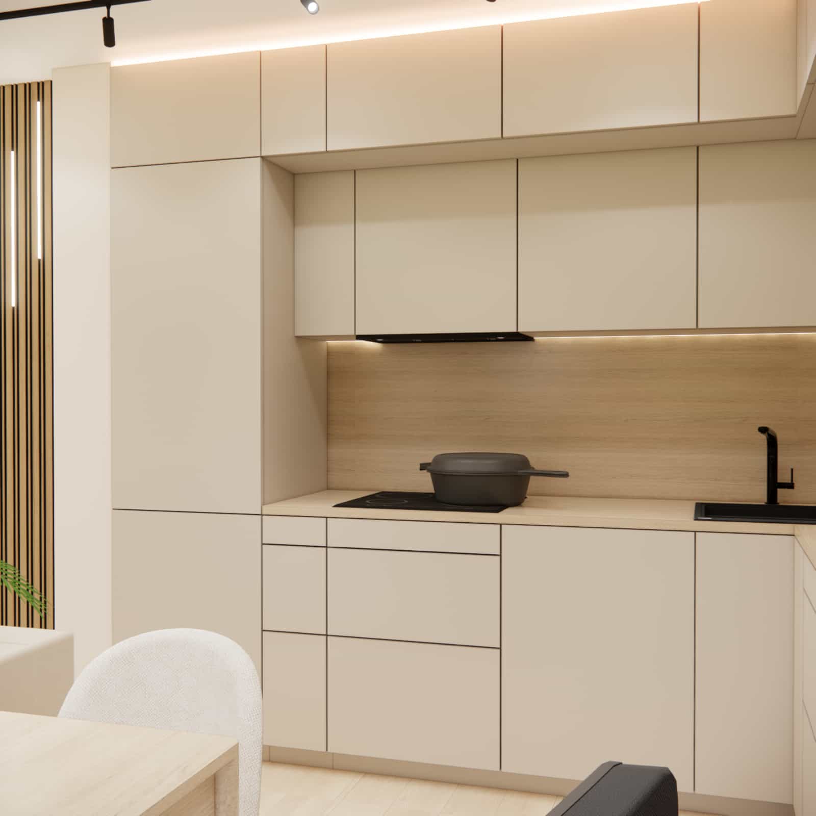 Kitchenette in a 22m2 living room – cashmere cabinetry, wood and a functional countertop