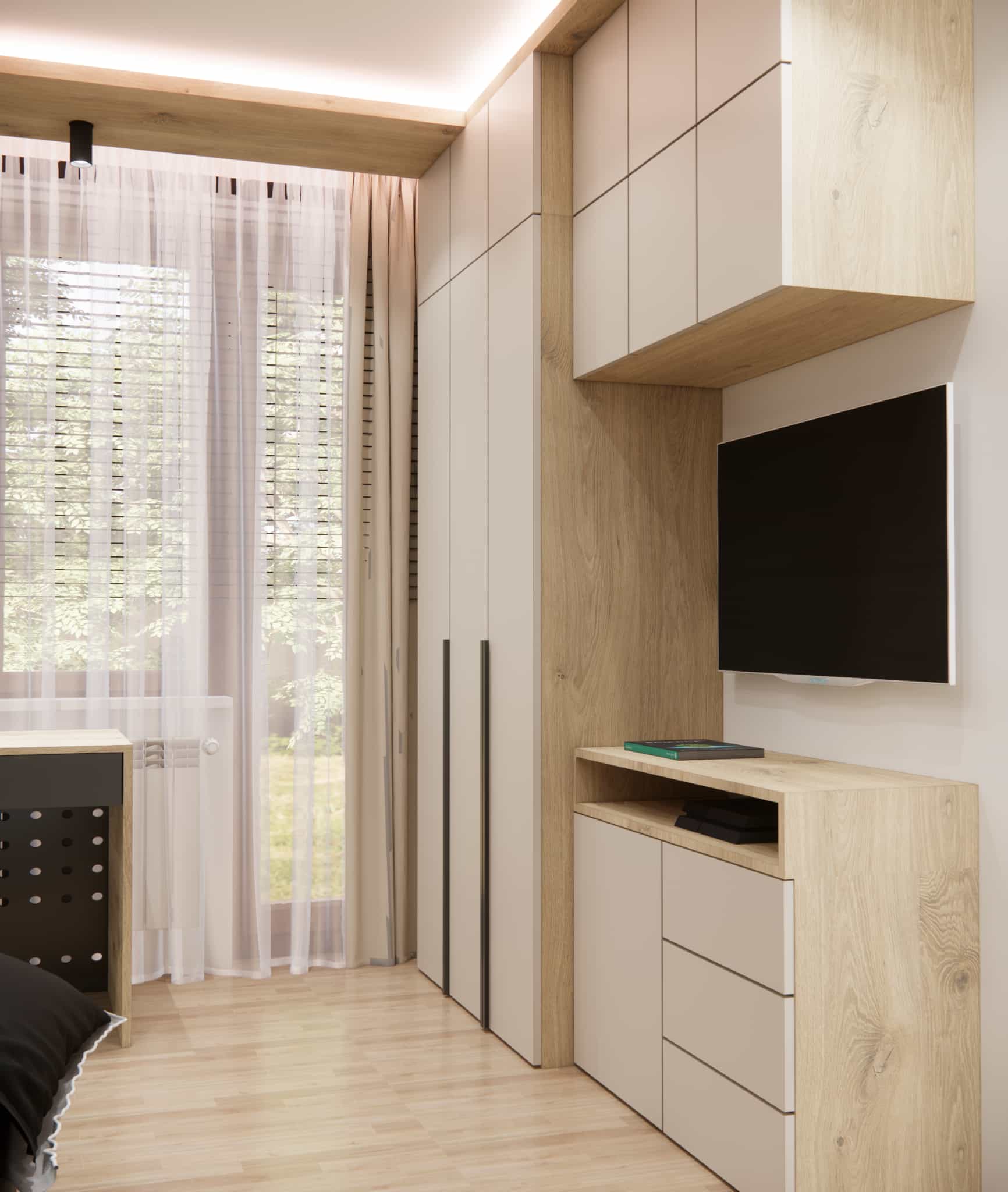 Built-in cabinetry in a teen room with TV area and beige wood finish
