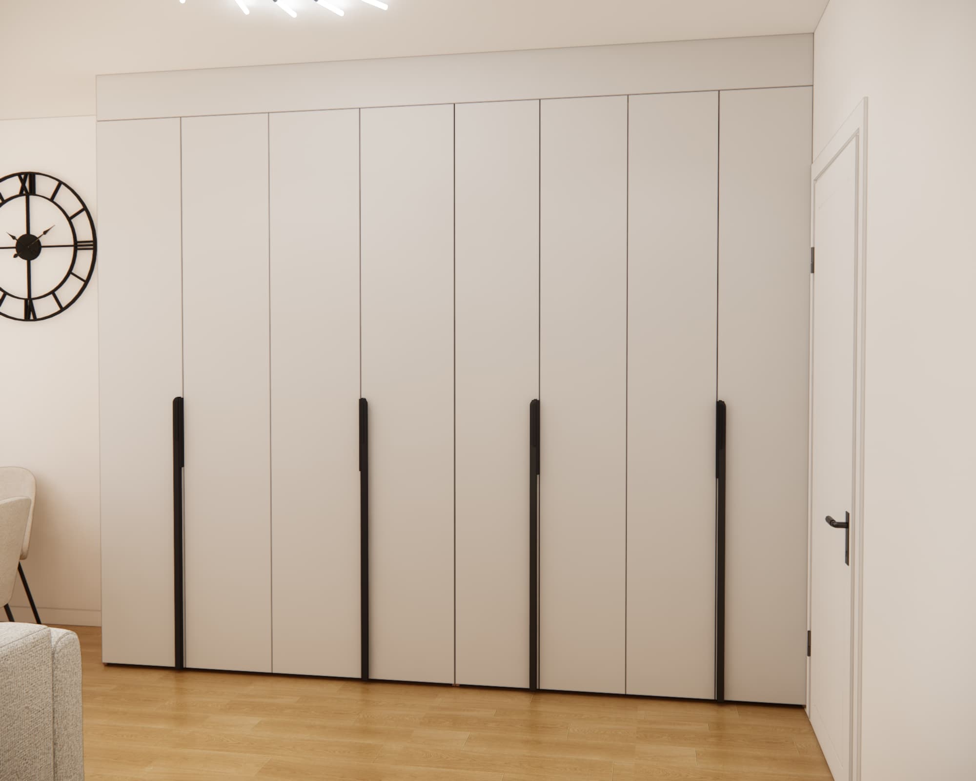Large full-wall wardrobe in the living room with light fronts and long black handles