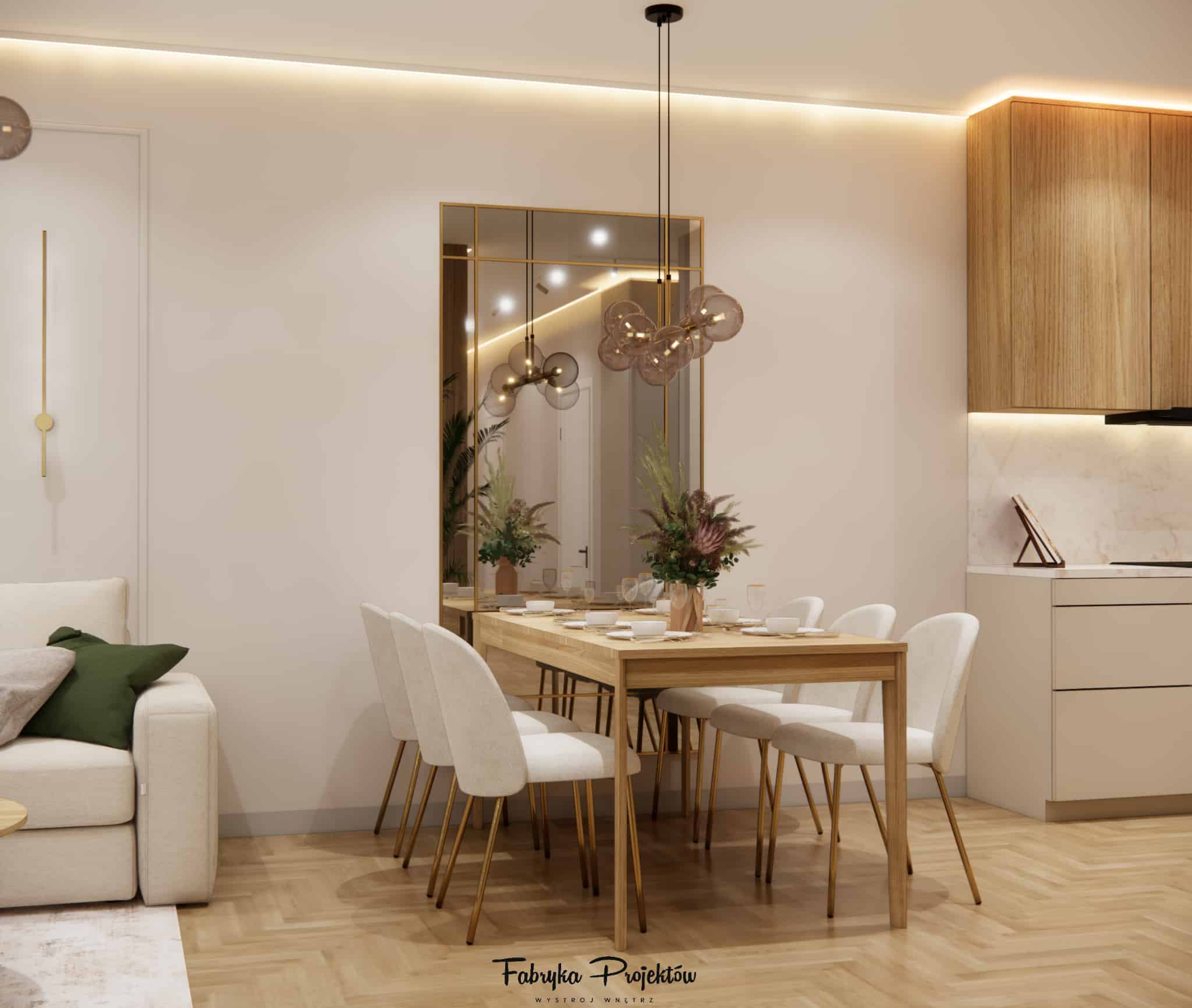 Bright dining room with a large mirror with gold detail and a view of a cashmere and wood kitchen.