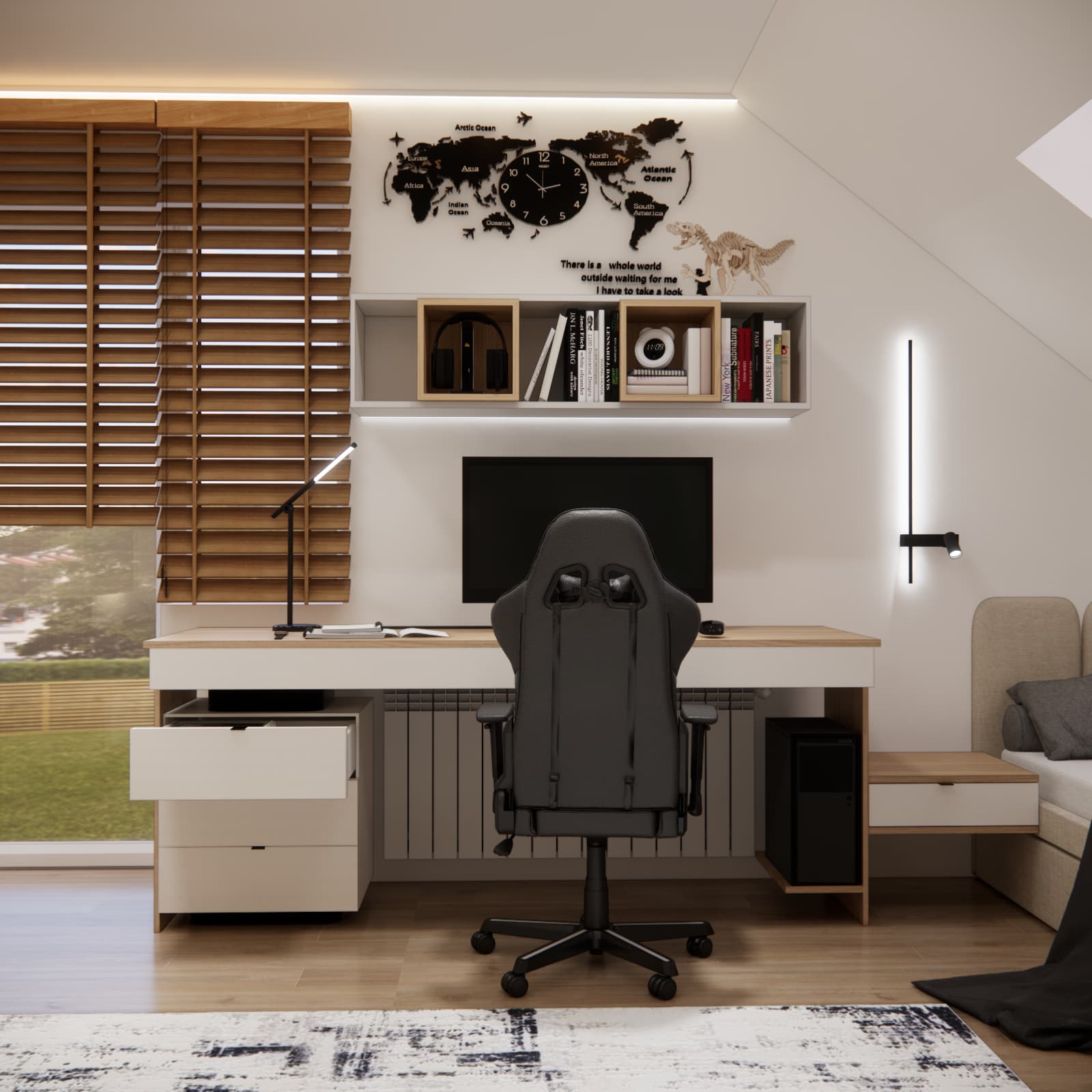 Long desk beneath the window in an 11-year-old boy’s room with a monitor and bookshelves