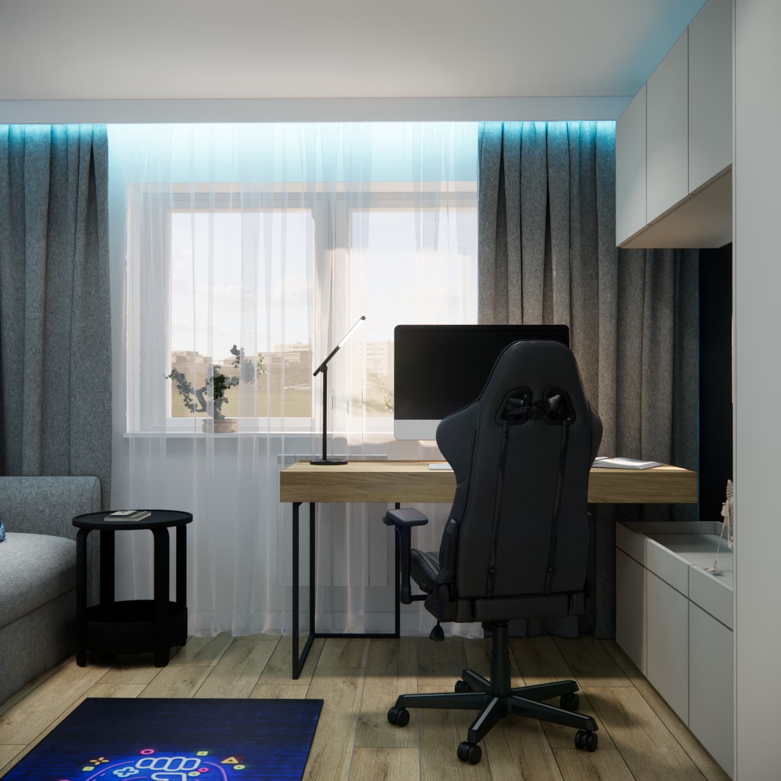 Widok od strony sofy na biurko przy oknie w pokoju Kacpra 10,83 m²