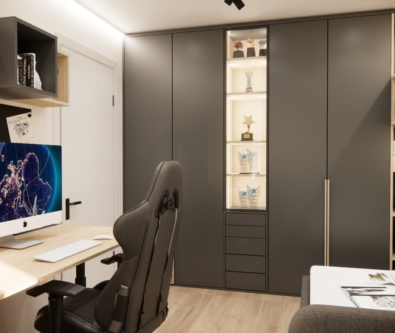 Modern built-in wardrobe with trophy display next to a gaming desk in a 9 m2 room.