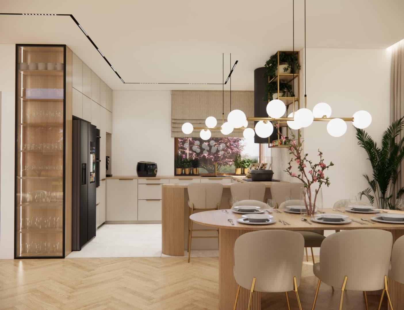 Open-plan kitchen connected to the dining area with modern globe lighting.