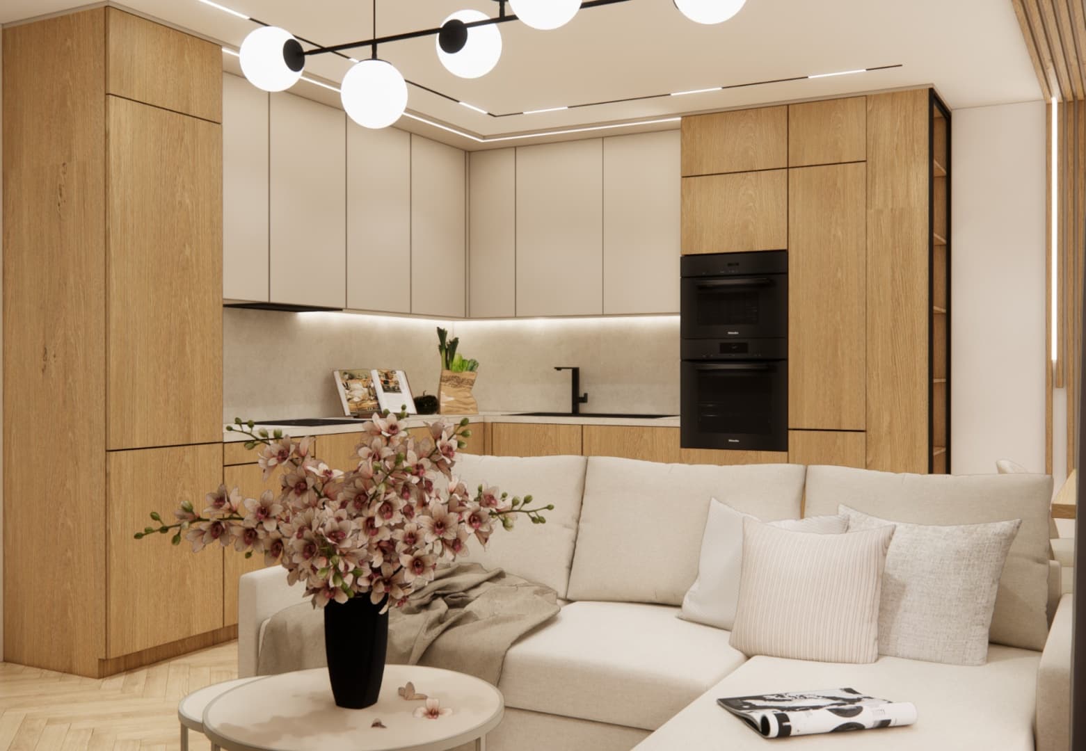 Overall view of the living room, kitchen, and dining area in a bright, cozy arrangement