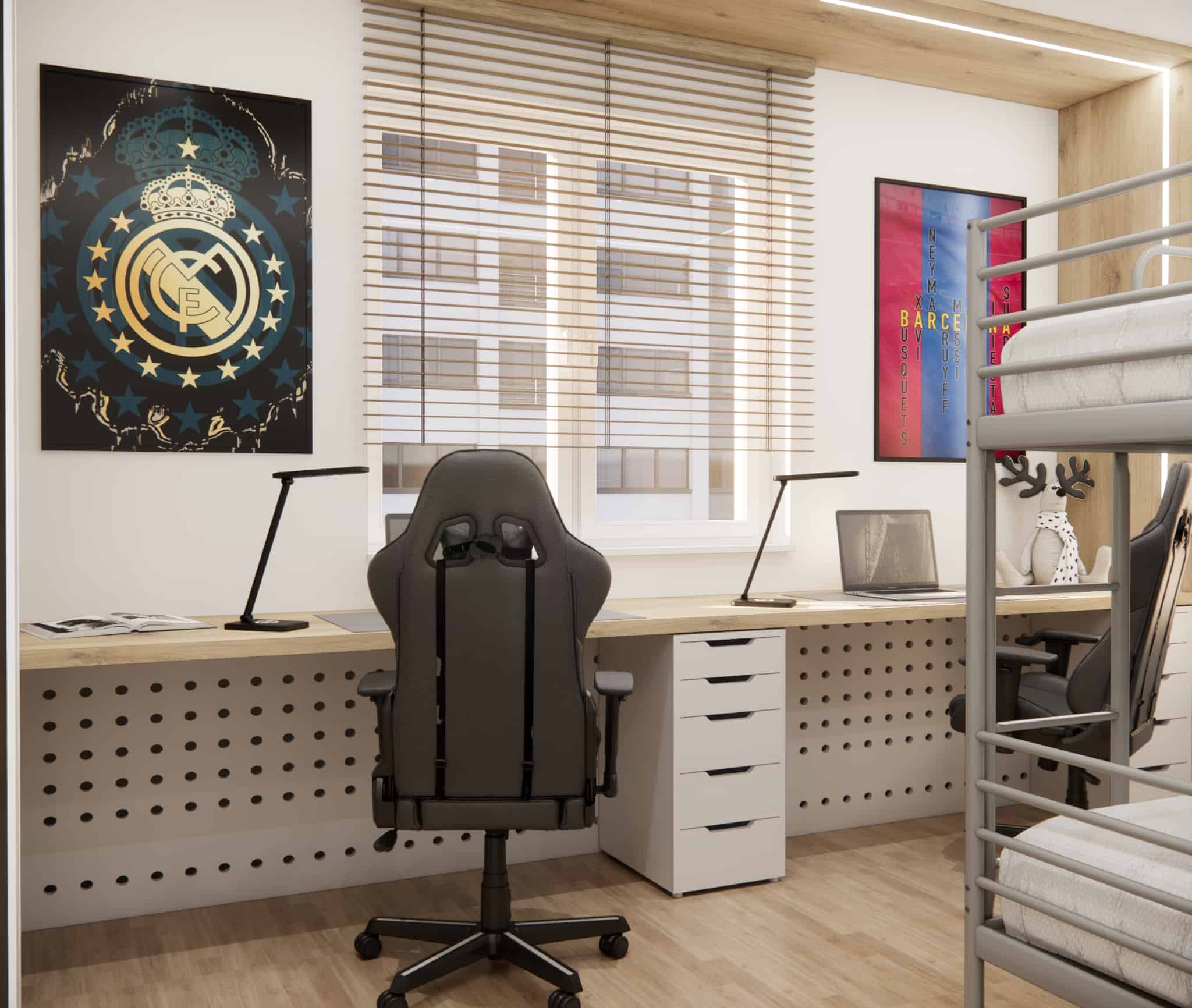 Desk area with wooden blinds by the window and football posters in a shared boys’ bedroom