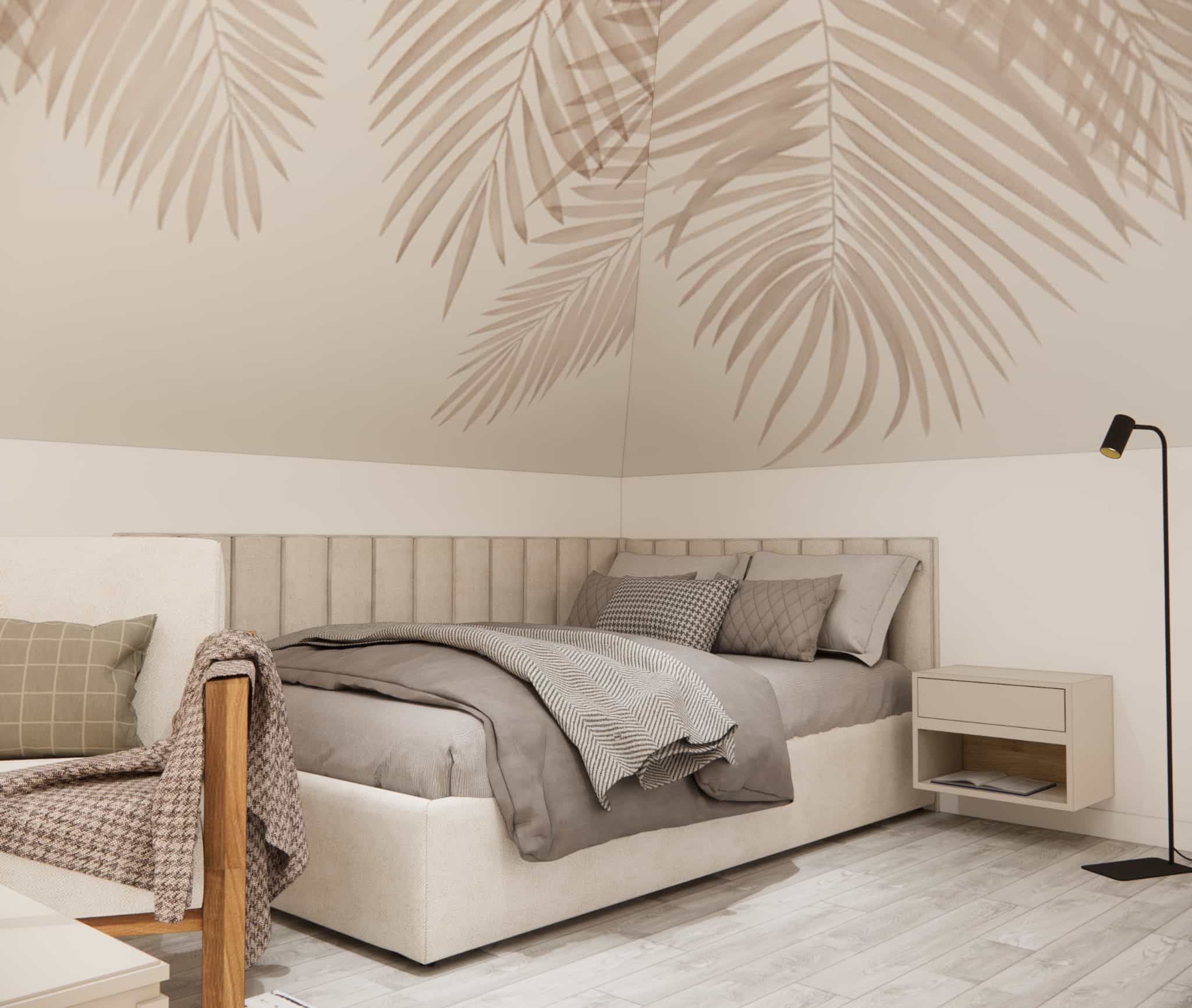 Bed under a sloped ceiling with a beige headboard and decorative leaf graphic in a bedroom for a 12-year-old girl
