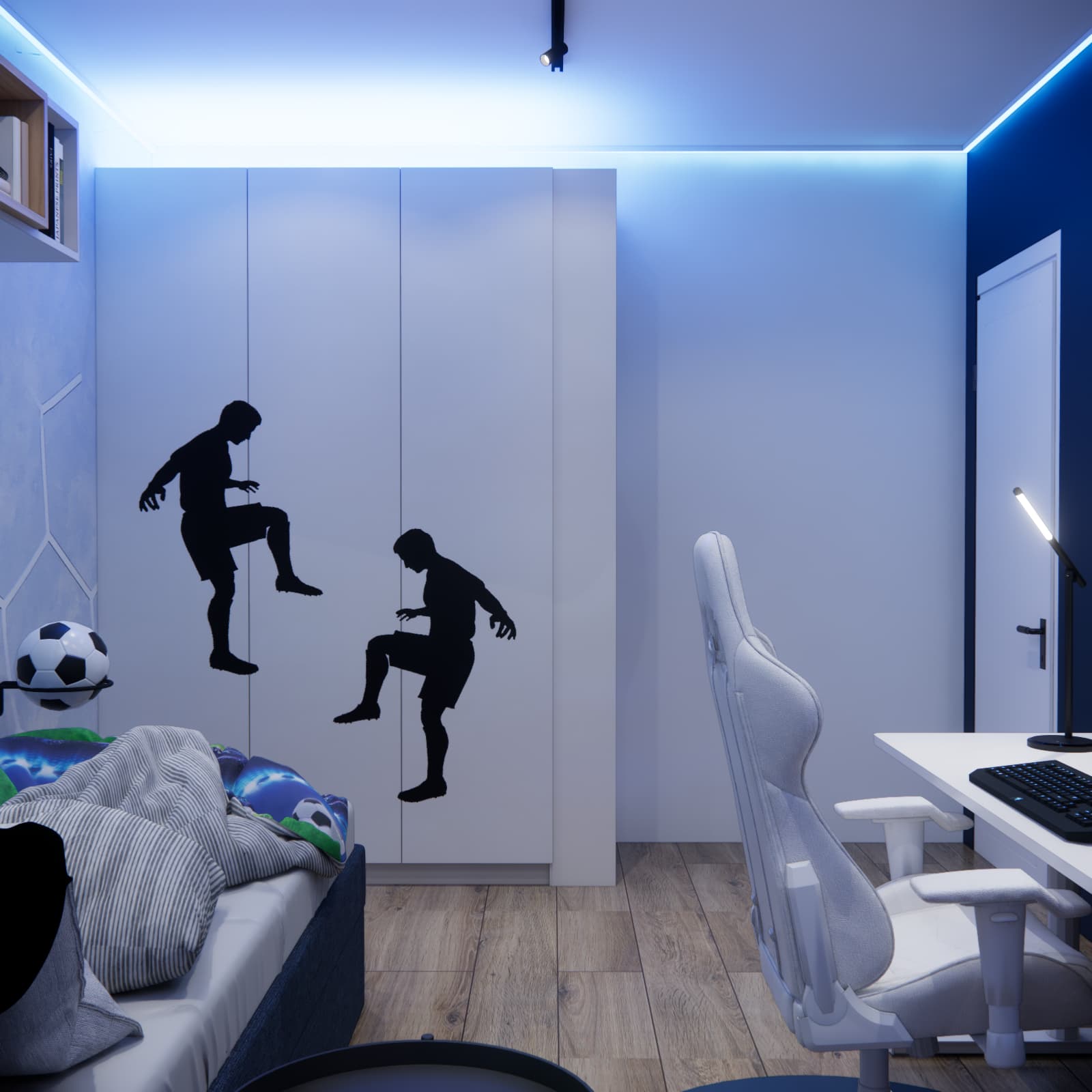 Wardrobe with football player silhouettes beside Patryk's computer workstation