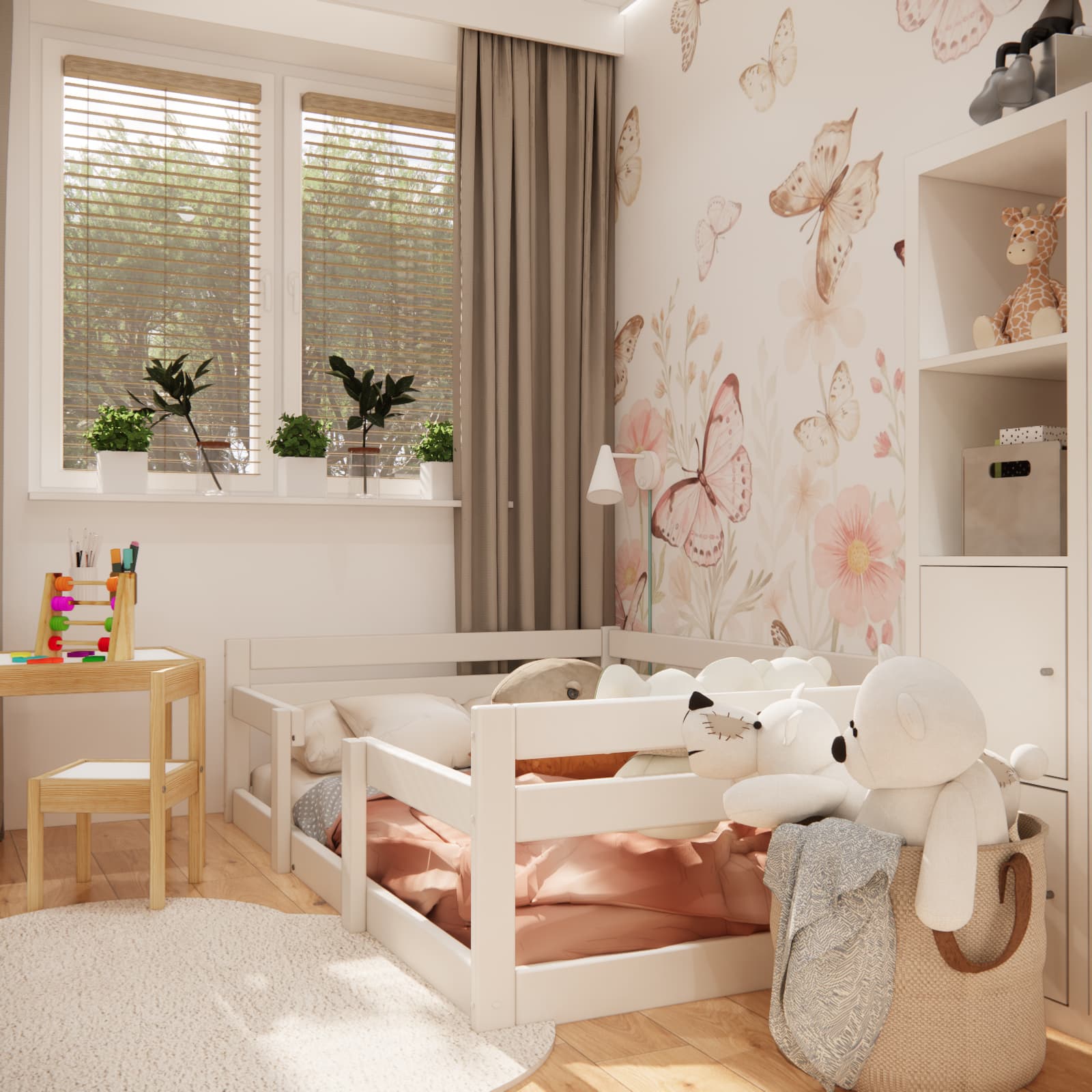 Low bed with safety rails in a little girl’s room, with a small table and butterfly wall decoration nearby