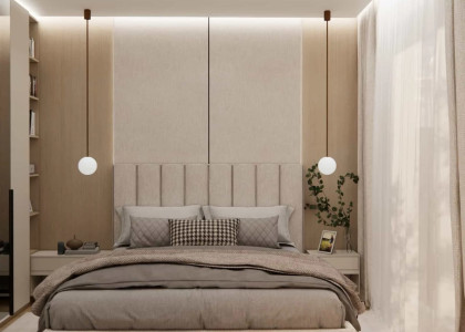 Bedroom design in cashmere tones – upholstered bed, wallpaper and warm wood